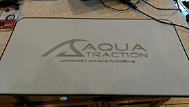 AquaTraction Pad light gray on black with laser etching